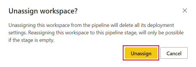 Uma captura de tela que mostra a janela pop-up Cancelar a atribuição do espaço de trabalho nos pipelines de implantação, com o botão Cancelar a atribuição realçado.