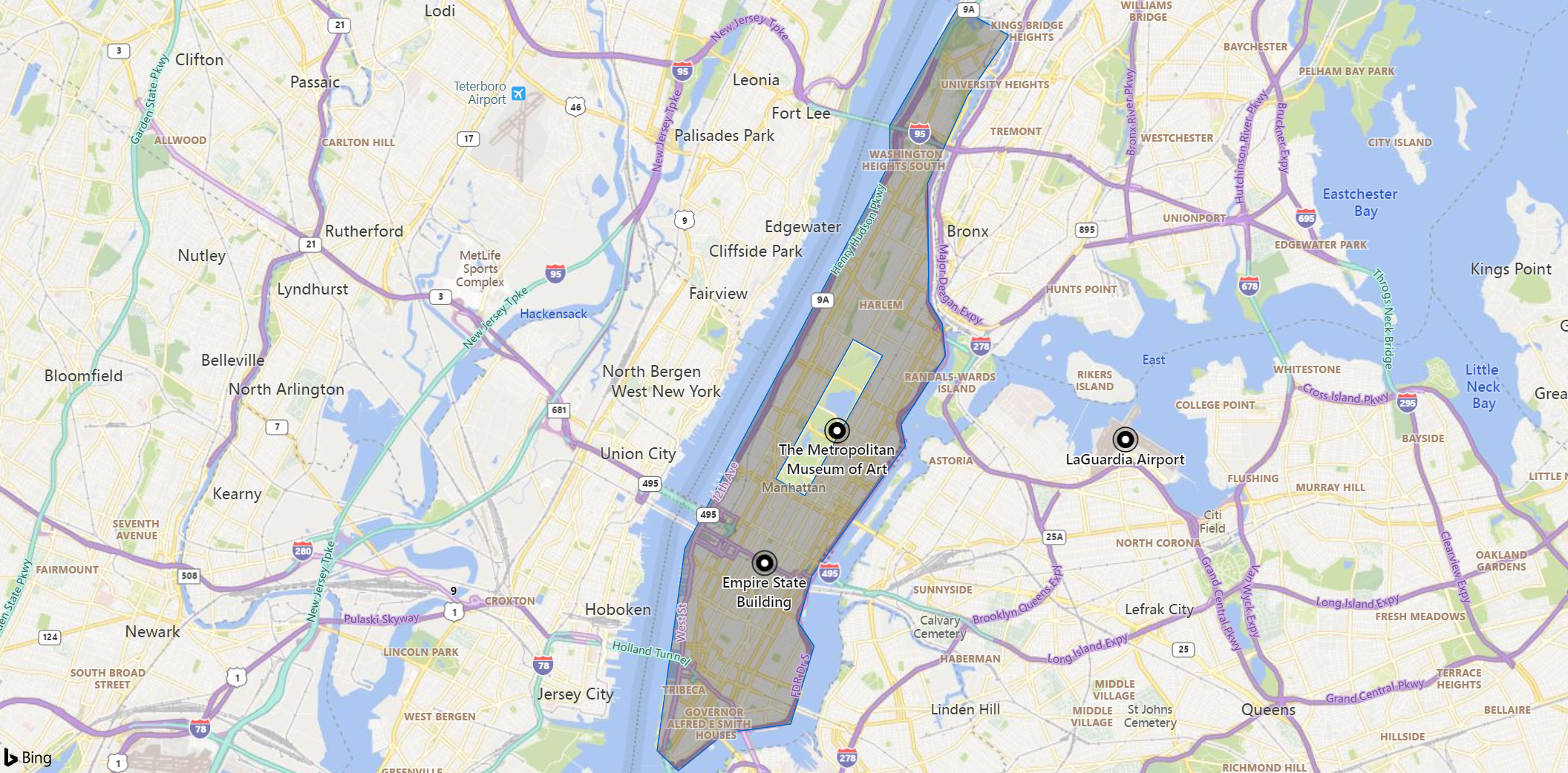 Captura de tela de um mapa da área de Manhattan, com marcadores para um ponto de referência, um museu e um aeroporto. A ilha parece esmaecida, exceto pelo Central Park.