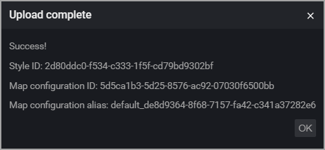 Uma captura de tela da caixa de diálogo de carregamento concluído no editor de estilo visual mostrando valores para o ID de estilo, ID de configuração do mapa e o alias de configuração do mapa.