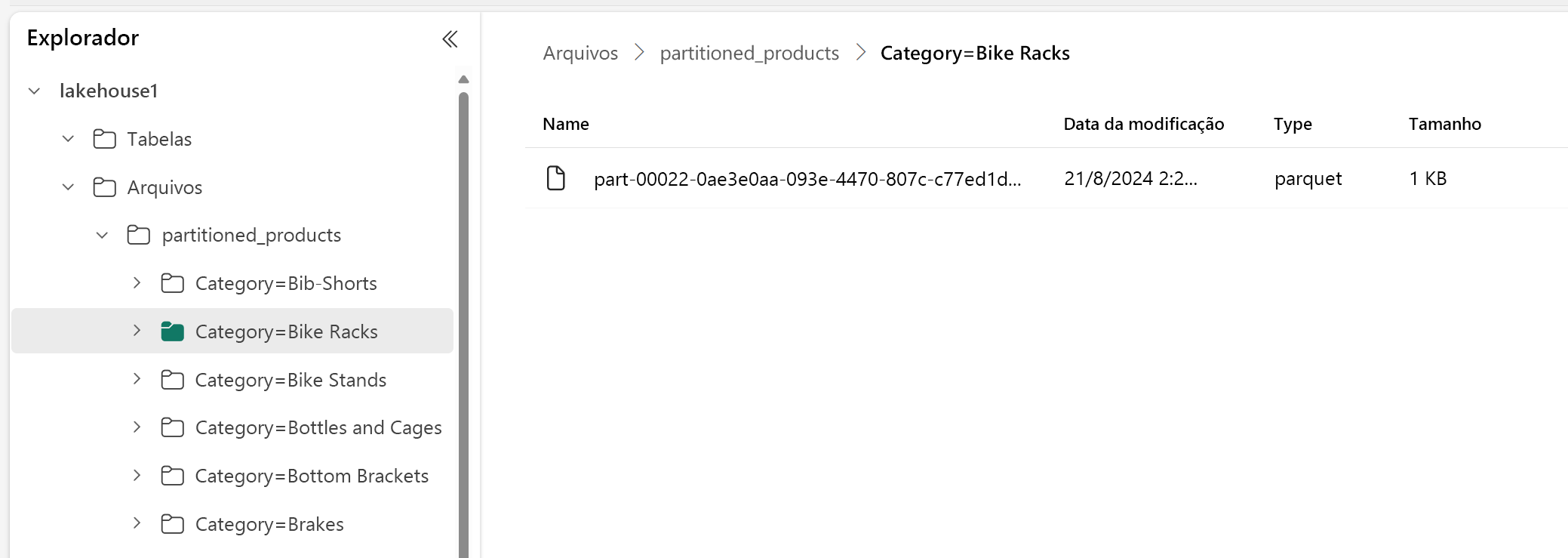 Imagem da tela do lakehouse explorer e do arquivo do produto particionado por categoria.