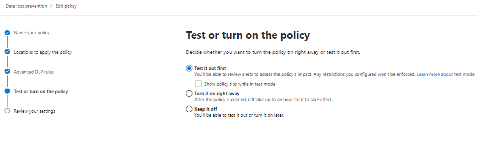 Skärmbild av fönstret Med rubriken Testa eller aktivera principen. Statusen Test it out first (Testa först) är markerad i principstatusen.