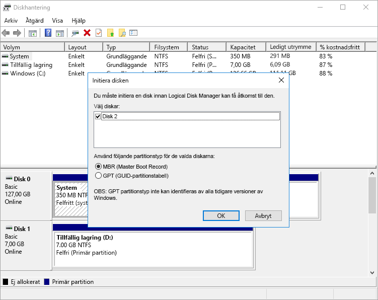 Skärmbild som visar diskhanteringsverktygets varning om en onitialiserad datadisk på den virtuella datorn.