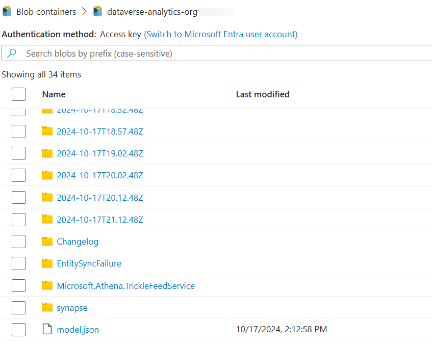 โฟลเดอร์ส่วนที่เพิ่มที่แสดงใน Azure Data Lake Storage ที่สร้างโดย Synapse Link