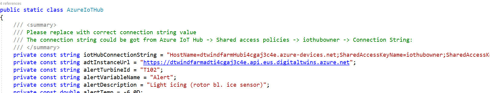 裝置模擬器解決方案的螢幕擷取畫面，其中已新增 Azure IoT 中樞 cs 檔案和主機名稱與執行個體 URL 值。